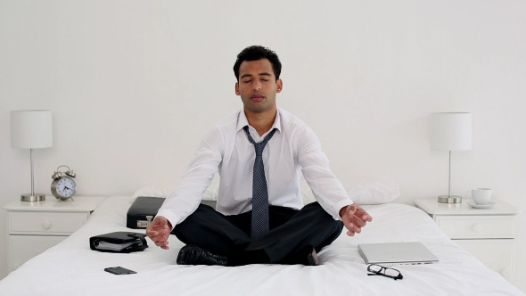 Happy Handsome Businessman Meditating