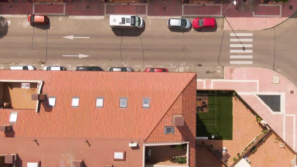 Apartment buildings and streets of Madrid, aerial top down view alt