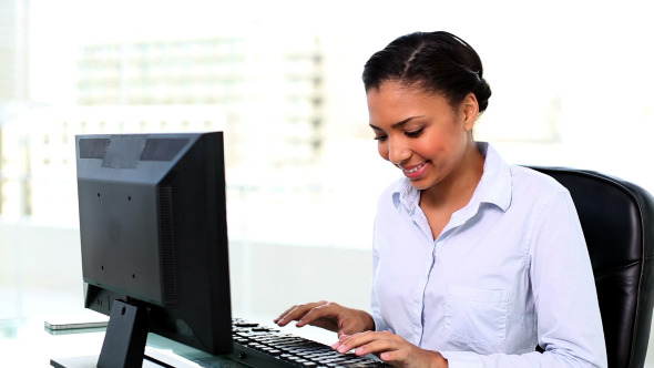 Young Businesswoman Working On Her Computer