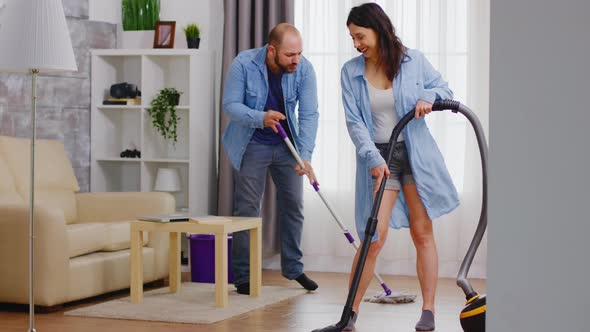 Enjoying House Cleaning alt