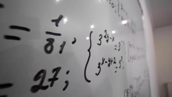 Solved Mathematics Equation on Whiteboard