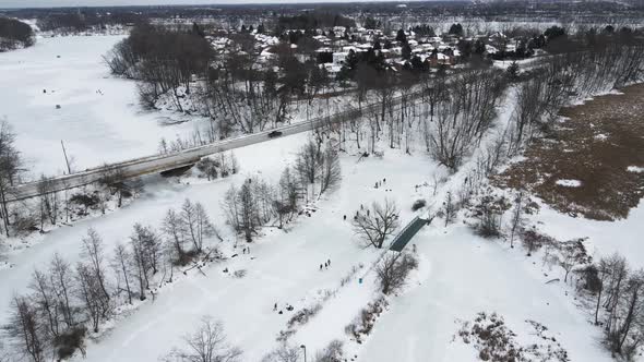 Aerial of Ice Skaters on Richardson Creek,Green Ribbon Trail, St Catharines, Ontario Canada alt