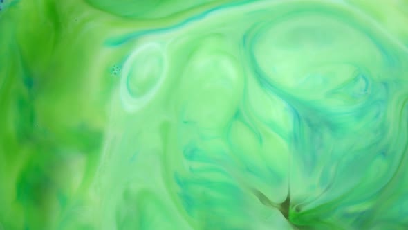 Footage, Ink in Water, Green Ink Reacting in Water Creating Abstract Background