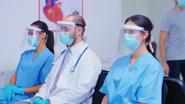 Tired Team of Medical Staff During COVID Pandemic alt