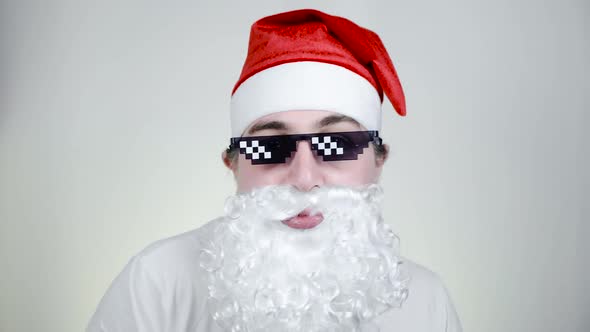 Dancing Swag Santa Claus in Funny Pixelated Sunglasses on White Background alt