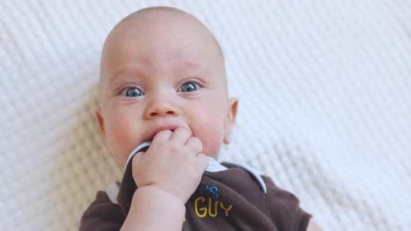 Caucasian Baby Portrait Grimacing Infant Looking to Camera Funny Face ...