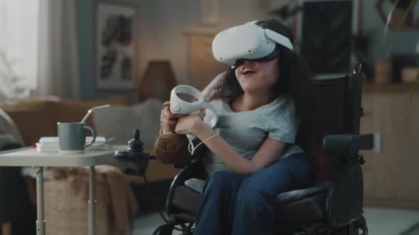 Woman in a Wheelchair Experiencing VR Glasses alt