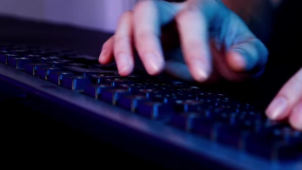 Close up man's hands typing on keyboard computer alt