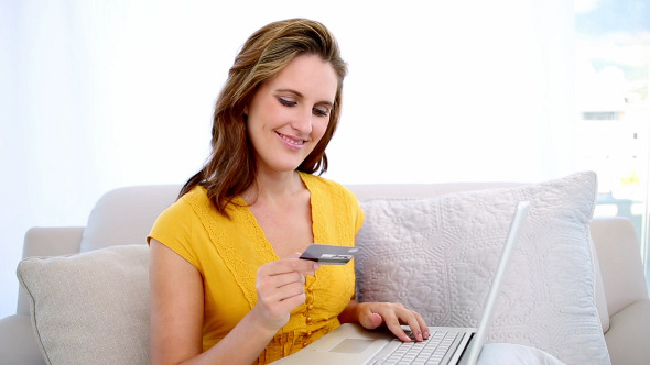 Happy Woman Shopping Online With Laptop
