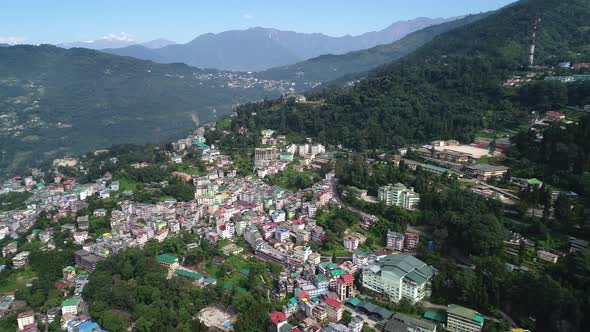 City of Gangtok in Sikkim India seen from the sky alt