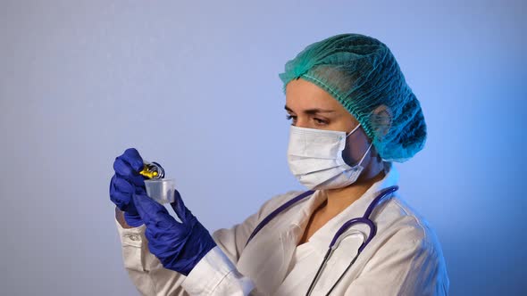 Doctor Pours Pills From Prescription Pill Bottle alt