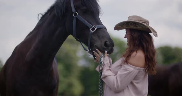 Woman Riding Horse on Farm. Recreation - Woman Walking with Horse alt