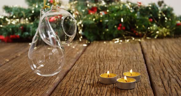 Tealight Candles with Hanging Glass Lamps on A Plank 4k alt