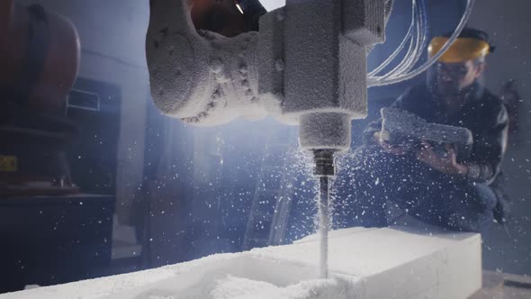 Craftsman Cutting Plastic Block with Milling Machine alt