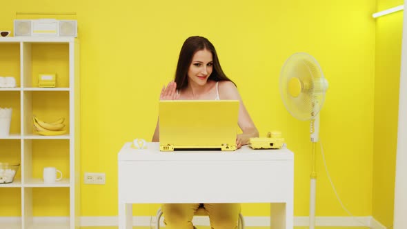 Young Woman Is Calling to Friend Online alt