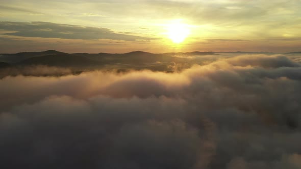 Sunrise Over Clouds Aerial View