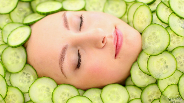 Natural Womans Face Surrounded By Cucumber 2