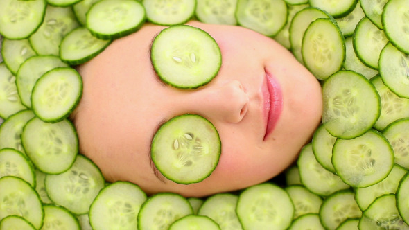 Smiling Womans Face Surrounded By Cucumber 2