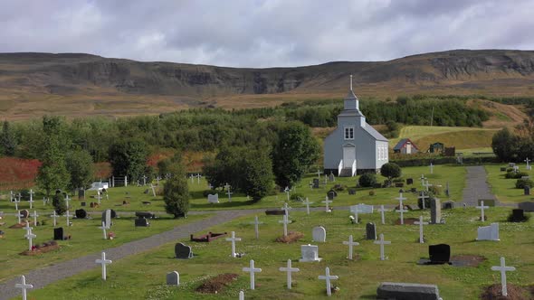 Old wooden Church and Cemetery in Iceland. 4K alt