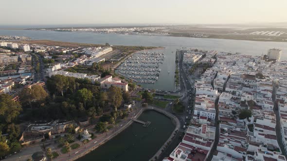 Aerial rotation Ayamonte City and marina landscape with Portugal as background alt
