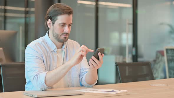 Man Using Phone alt