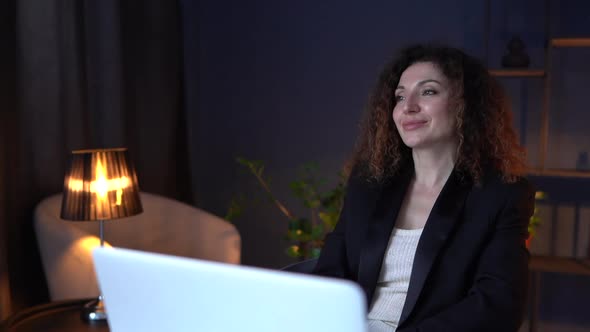 Adult Attractive Brunette Business Woman Chatting Using Her Notebook alt