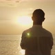 Lonely Man Looking Forward To the Sunset Over the Sea - VideoHive Item for Sale
