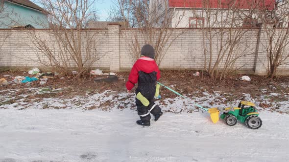 Boy Walking And Garbage On Street Slow Motion alt