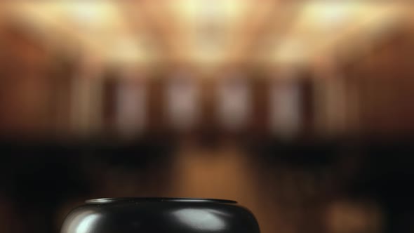 Judge is Hitting Gavel Off a Block in Courtroom alt