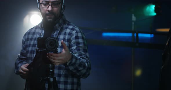 Young Director Giving Instructions on a Film Set alt