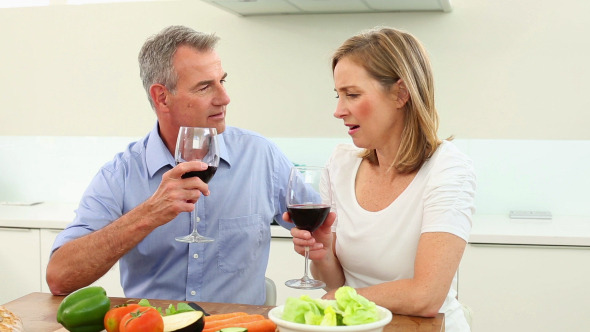 Mature Couple Drinking Red Wine Together 2