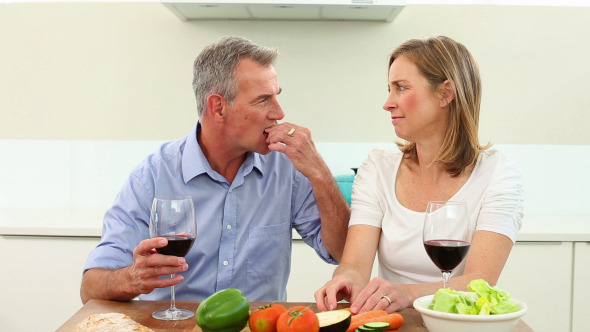 Mature Couple Drinking Red Wine Together 3