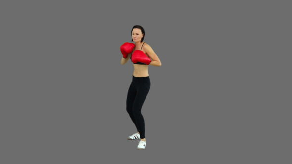 Fit Brunette Boxing With Red Gloves 3
