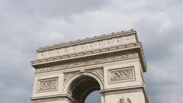Great France and Paris famous symbol Arc de Triomphe  by the day 4K 2160p UltraHD tilt footage - Fre alt