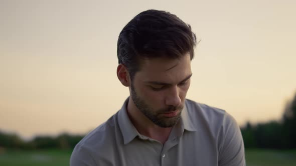 Focused Man Posing Outside alt