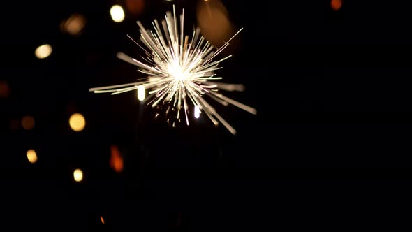 Super Slow Motion Shot of Sparkler Isolated on Black Background at 1000Fps alt