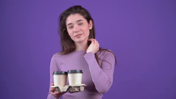 The Portrait of a Charismatic Girl Shamefully Wears Her Hair Behind Her Ears with Four Glasses of alt