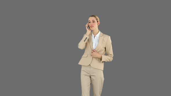 Angry Businesswoman Talking On The Phone 2