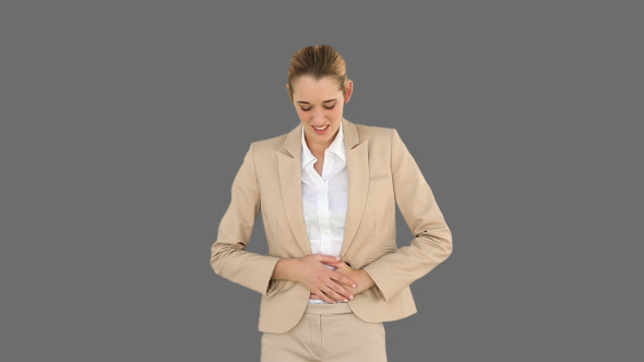 Businesswoman Rubbing Her Sore Stomach 2