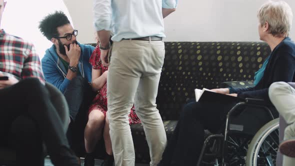 Doctor consulting patient in hospital waiting room