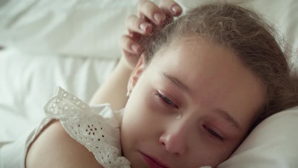 Portrait Cute Upset Child Little Girl with Big Tears Flowing Down His Cheekschild Lies at Home on alt