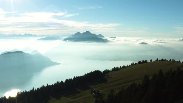 aerial view over amazing mountain landscape with fog covered mountains and lake. rigi switzerland alt