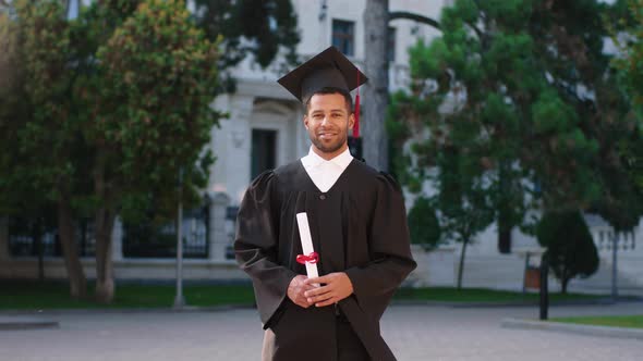 Good Looking Guy in His Graduation Day Wearing a alt
