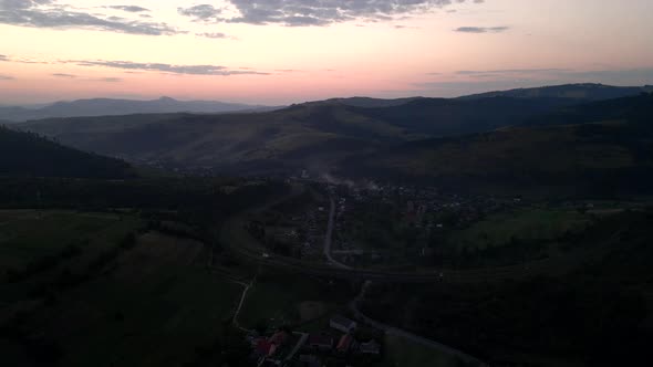 Aerial View of Sunset Above Carpathian Mountains Range alt