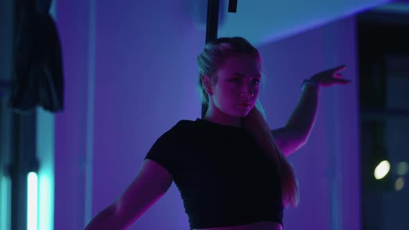 Pretty Young Blonde is Doing Dance Moves By Hands in Flyyoga Class Healthy Lifestyle alt