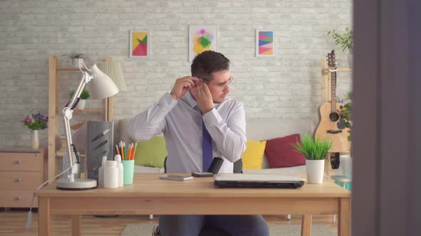 Surprised and Glad Hard of Hearing Man for the First Time Wearing a Hearing Aid alt