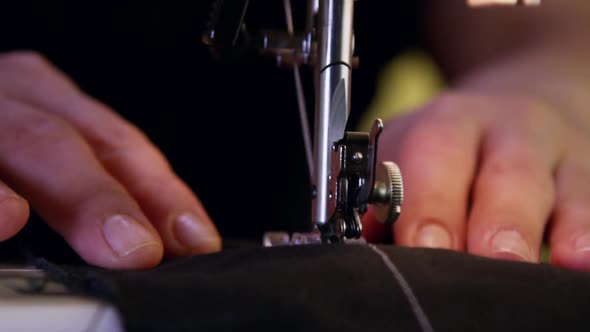Tailor Sewing Clothes With Sewing Machine 27