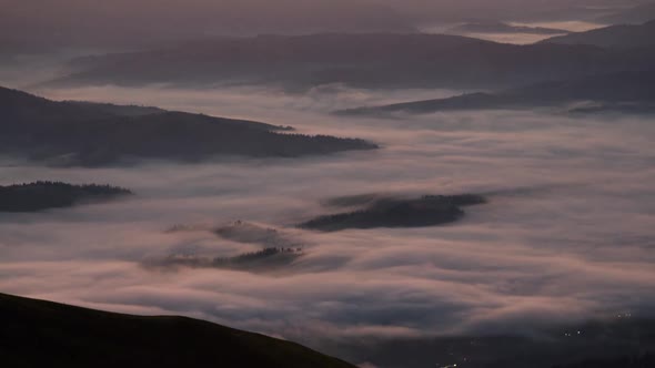 Time Lapse Fog Rolling Over Mountain Valley