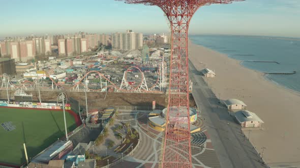Aerial Drone Shot Ascending Past the Tower at Coney Island During Winter