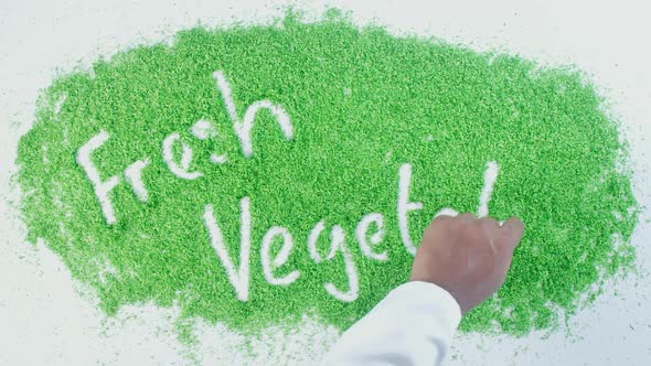 Indian Hand Writes On Green Fresh Vegetables